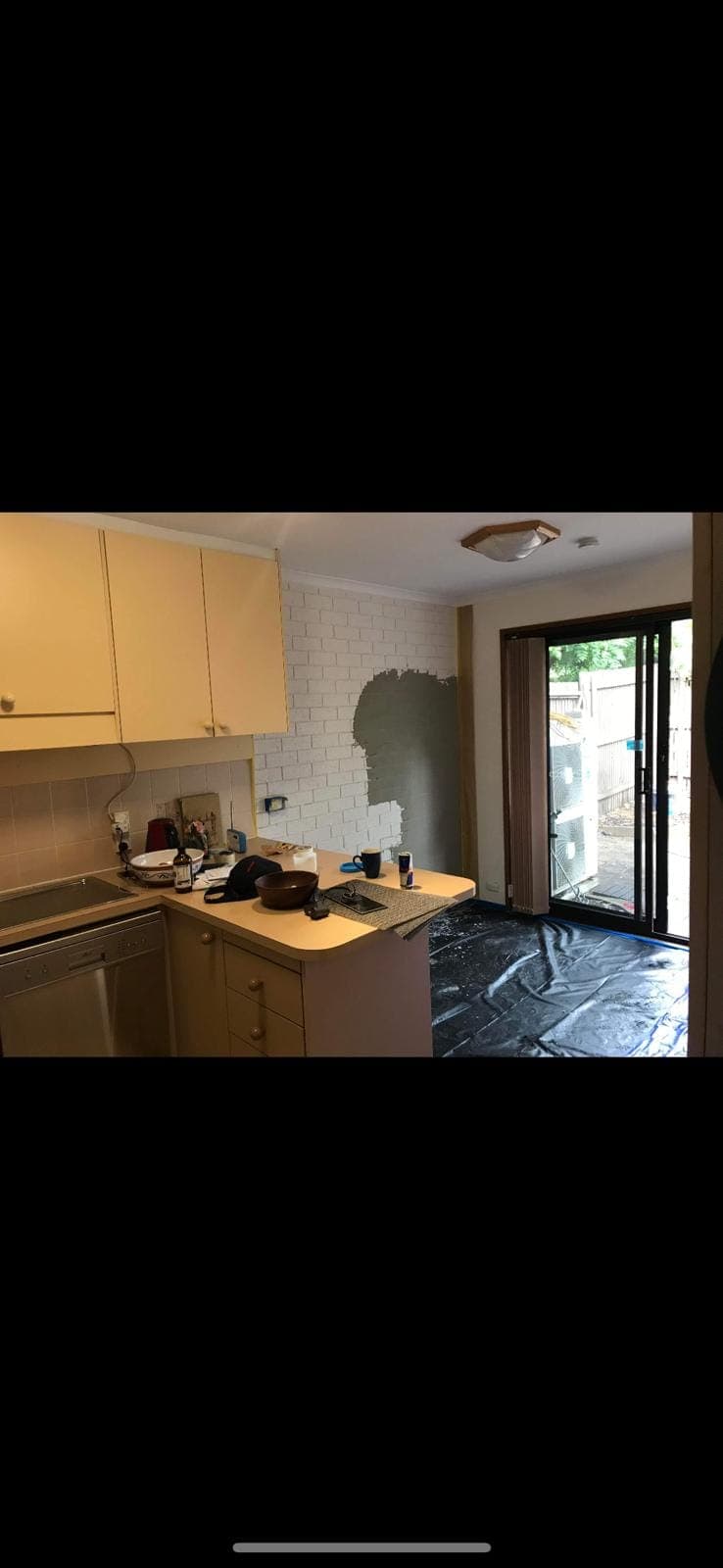 Renovation photo: kitchen with white subway tile splashback