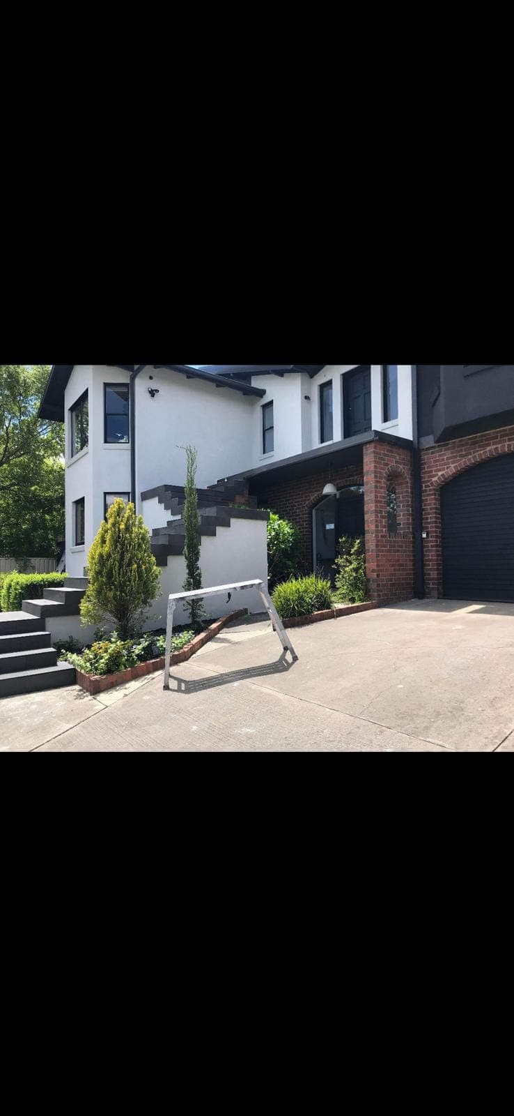 Renovation photo: modern two storey house exterior with garden