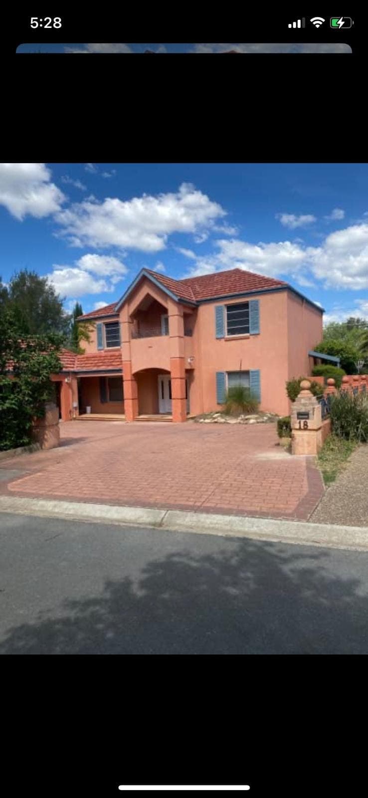 Renovation photo: mediterranean style rendered house exterior