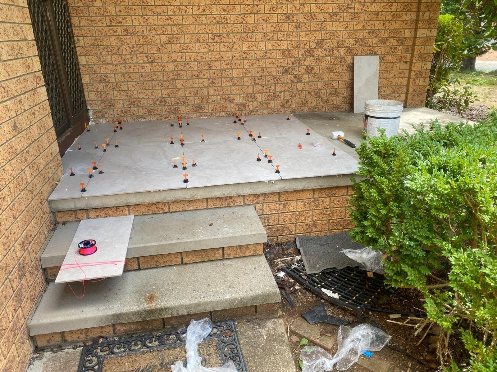 Renovation photo: concrete steps with landscaping in progress