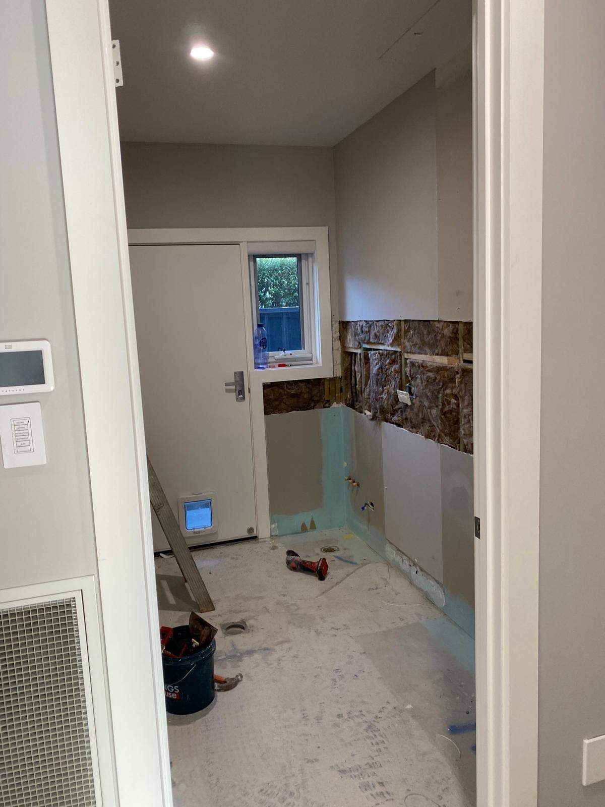 Renovation photo: hallway with drywall installation in progress