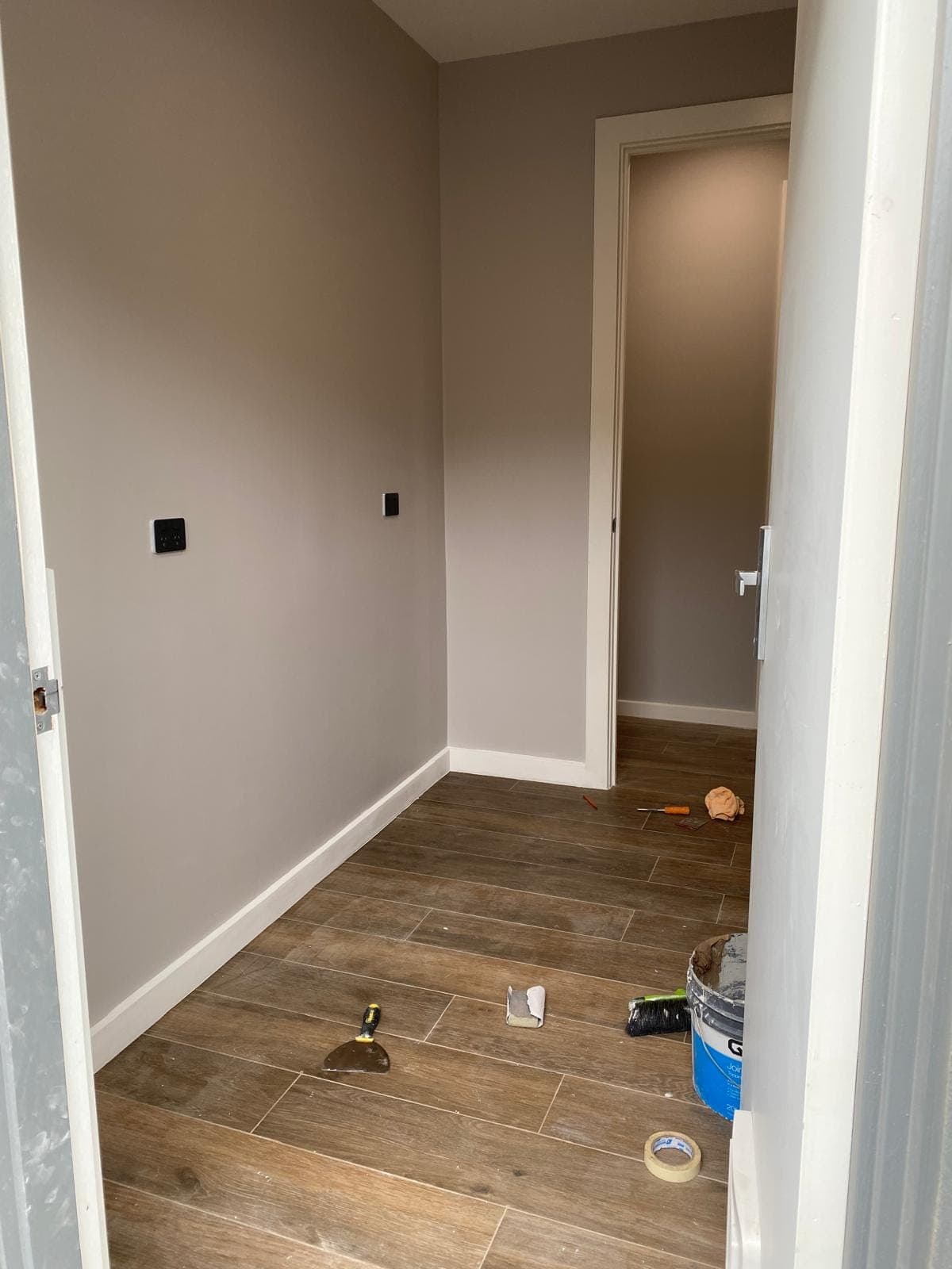 Renovation photo: hallway with freshly painted light walls