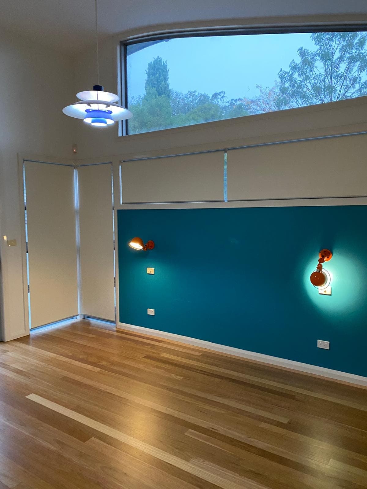 Renovation photo: room with teal blue painted accent wall