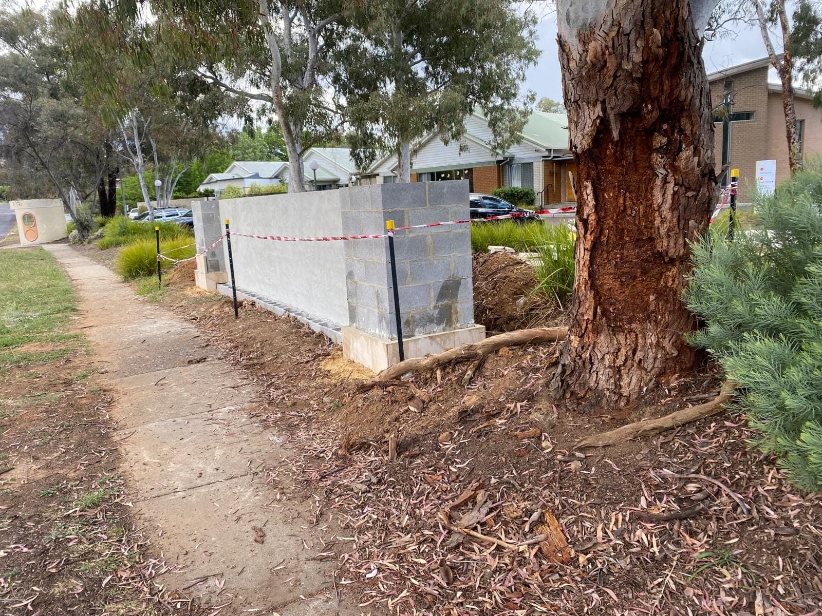Renovation photo: garden area with red brick fence base