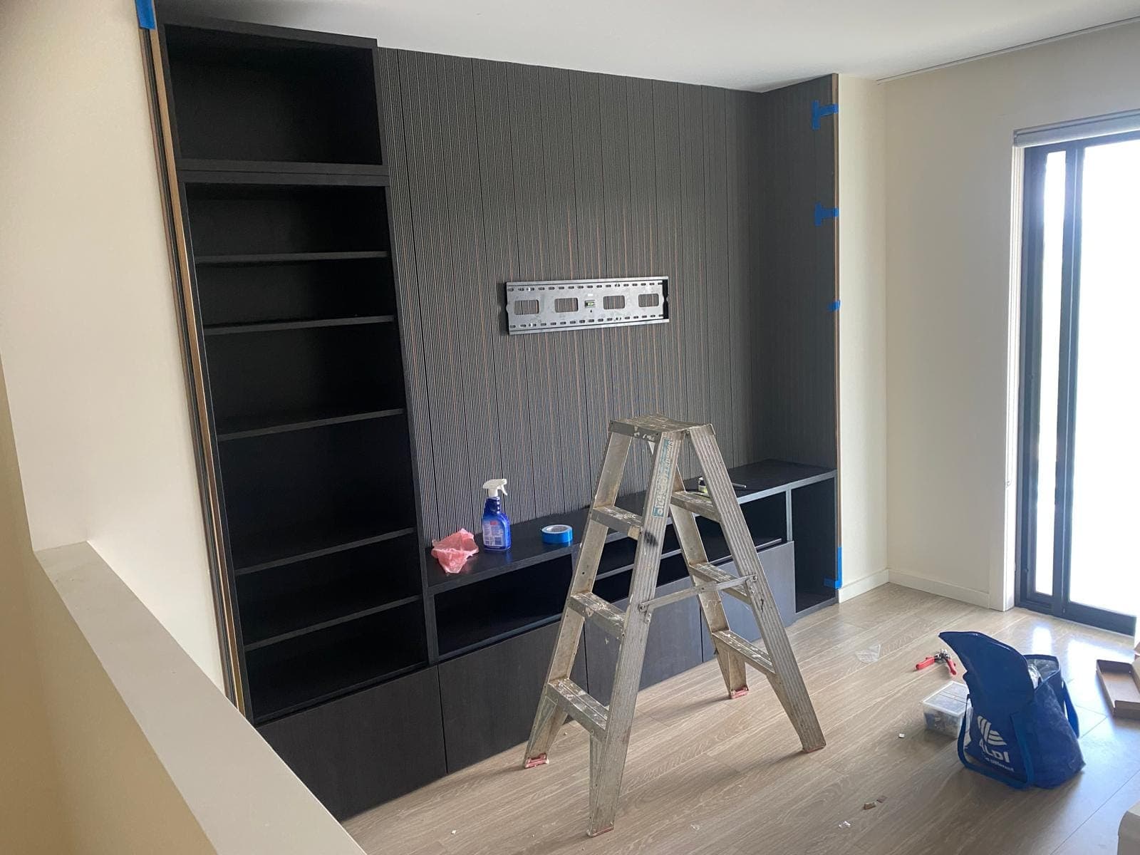 Renovation photo: built in cabinet with stepladder for install